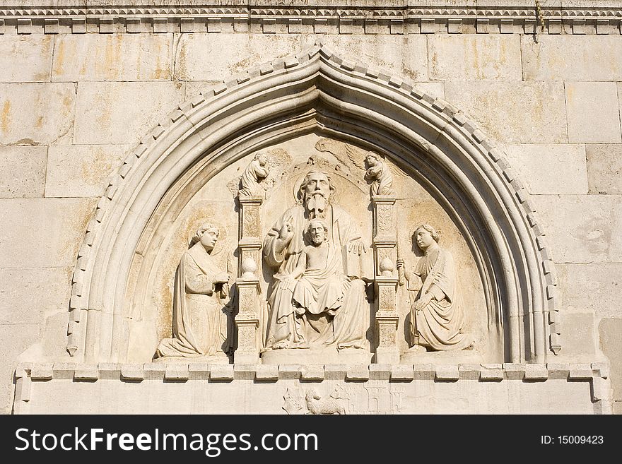 Trinity, high relief sculpture - Cathedral of Muggia, Italy. Trinity, high relief sculpture - Cathedral of Muggia, Italy