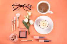 Flat Lay Composition With Cosmetic Products, Cup Of Coffee And Cupcake On Color Background Stock Photos