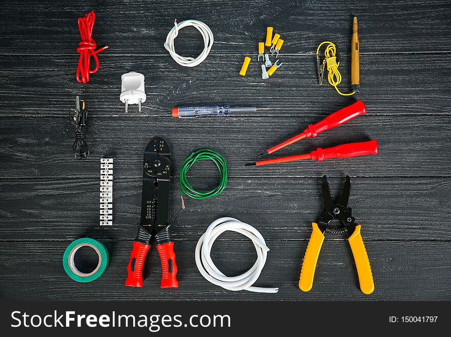 Flat Lay Composition With Electrical Tools On Wooden Background