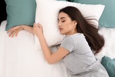 Young Beautiful Woman Sleeping In Morning At Home Royalty Free Stock Image