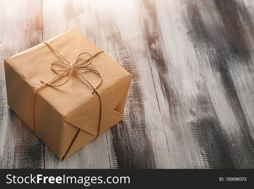 Beautiful Gift Box On Wooden Background