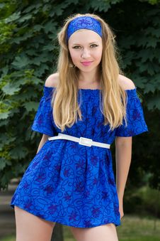 Pretty Young Woman In Blue Dress Posing Royalty Free Stock Images Pretty Young Woman In Blue Dress Posing Royalty Free Stock Images
