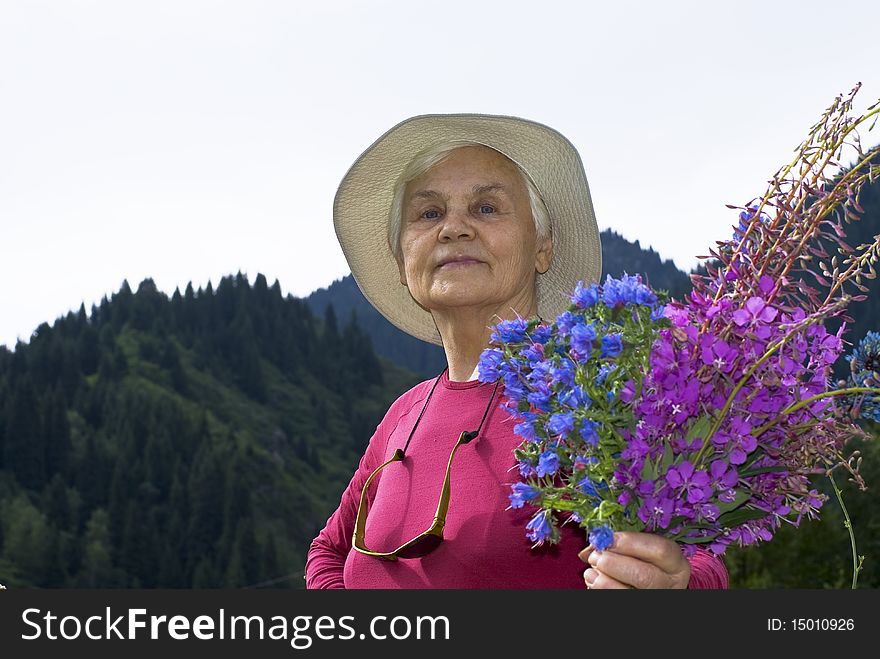 Mature woman with flowers