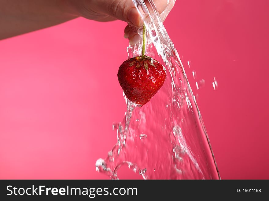 Close-up view of washed fresh strawberry