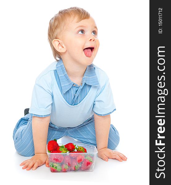 Boy with strawberry. Isolated on white background