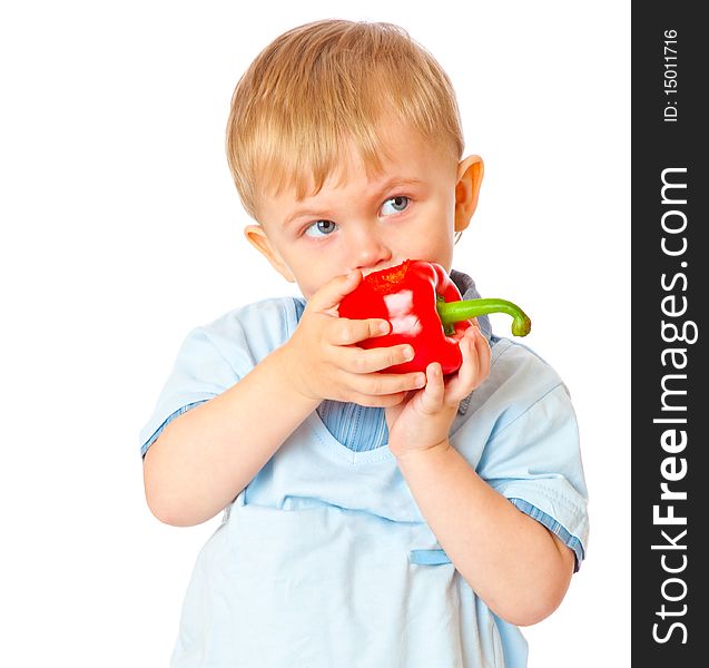 Boy with sweet pepper. Isolated on white
