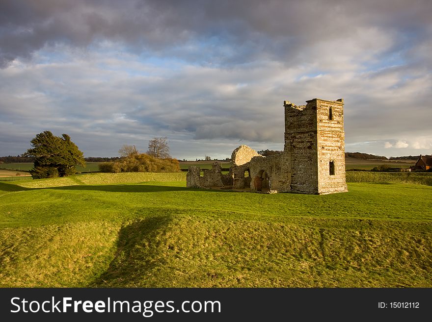 Late autumn sunshine on the remains of the medieval church at Knowlton , Dorset. Late autumn sunshine on the remains of the medieval church at Knowlton , Dorset