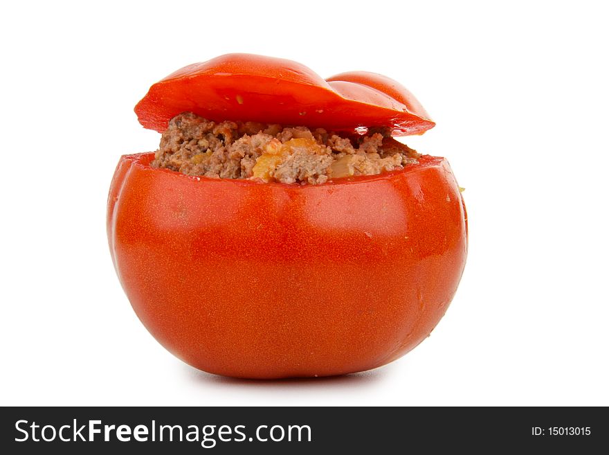 Isolated stuffed tomato on white