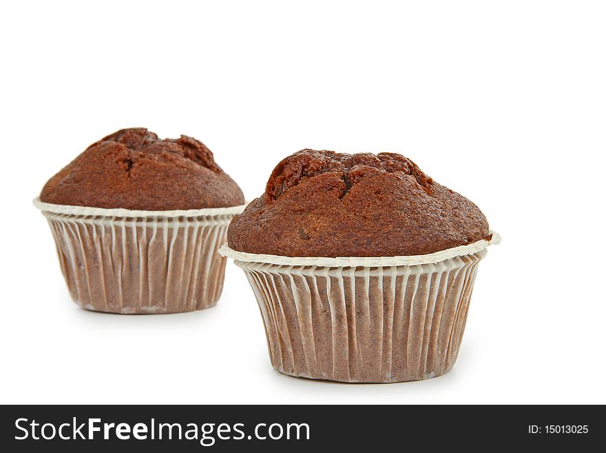 Two chocolate muffin isolated on white