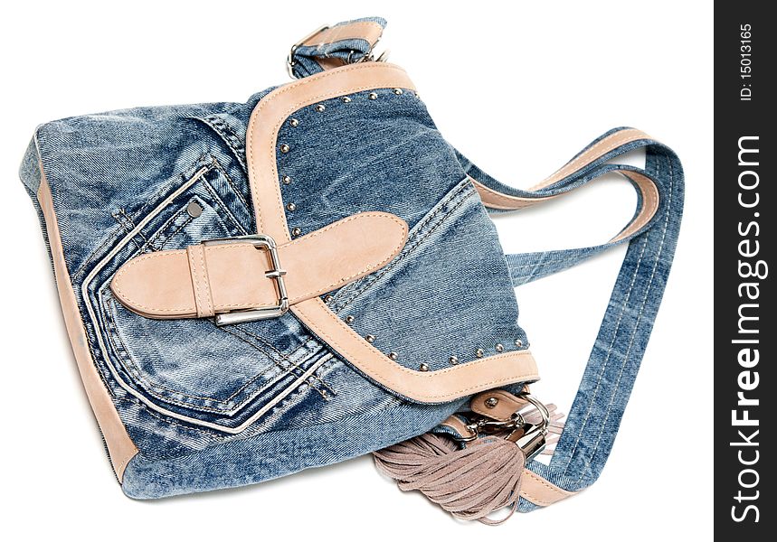 Feminine jeans bag with leather insertion on white background