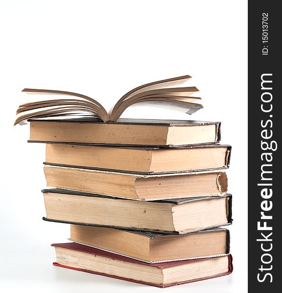 Stack of books on white background