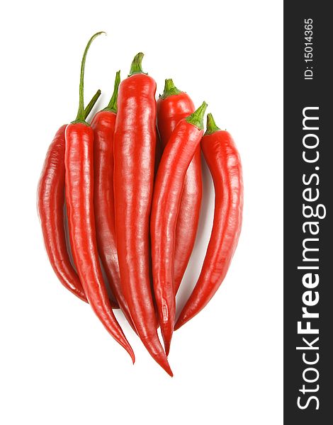 A heap of red hot chilli peppers isolated on a white background. A heap of red hot chilli peppers isolated on a white background