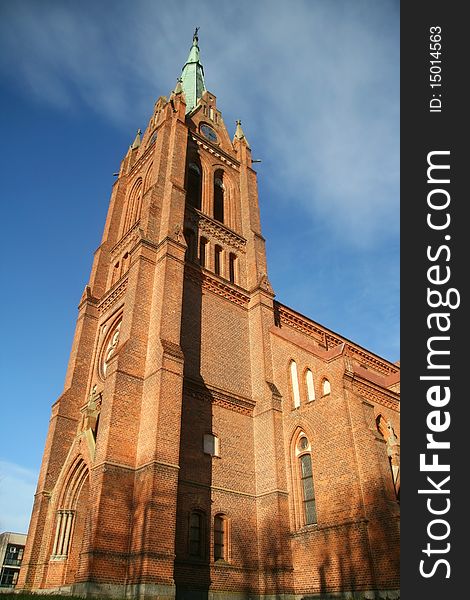 Old church from a red brick in Lithuania;