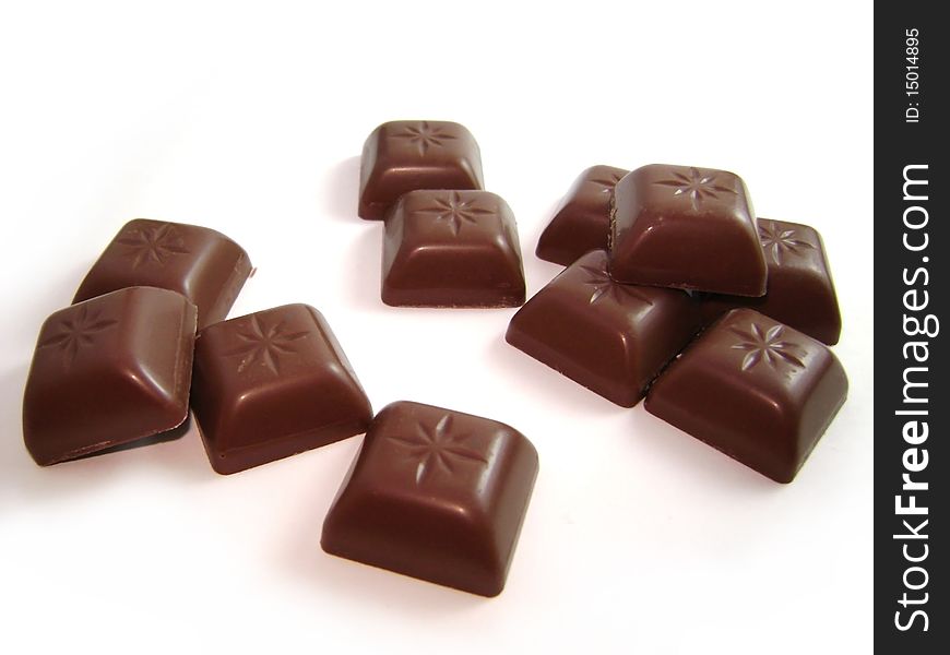 Milk chocolate blocks, isolated macro