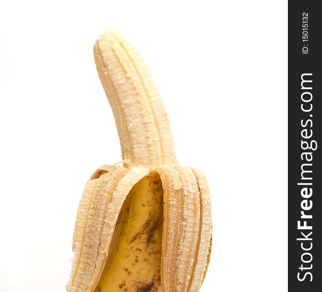 Open banana it is isolated on a white background. Open banana it is isolated on a white background.