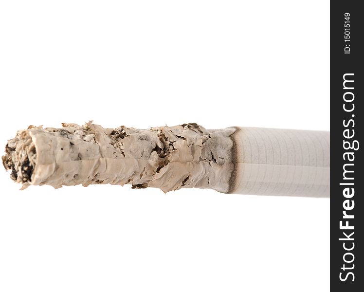 Smoldering cigarette is isolated on a white background. Smoldering cigarette is isolated on a white background.