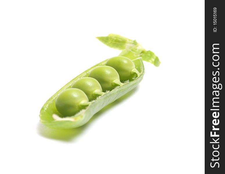 Half of a pod of peas on a white background. Half of a pod of peas on a white background.