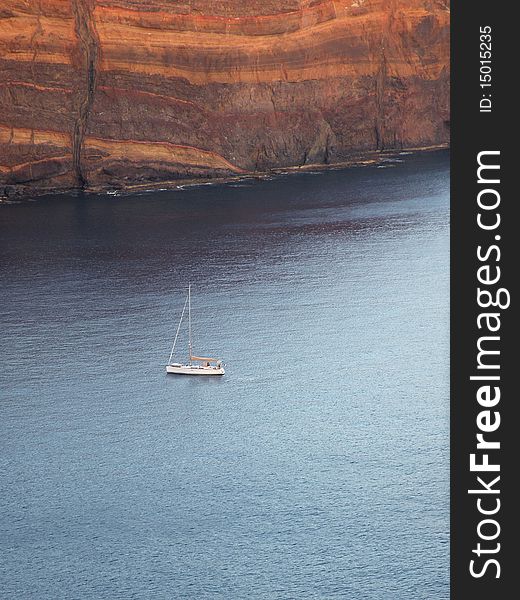 Sailing bout near mountain on sea in Madeira. Sailing bout near mountain on sea in Madeira