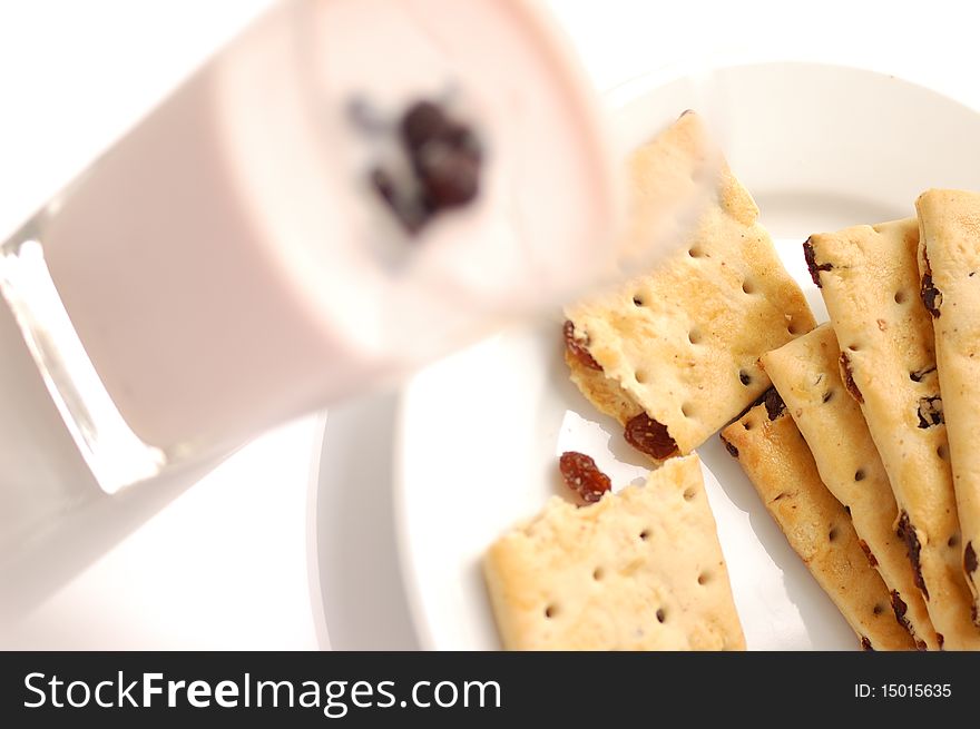 Berry yogurt in a glass and raisin cookies. Berry yogurt in a glass and raisin cookies