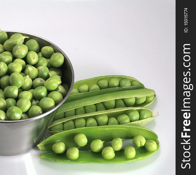 Basket of peas in spring