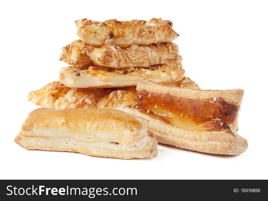 Pastry with cheese and marzipan on white