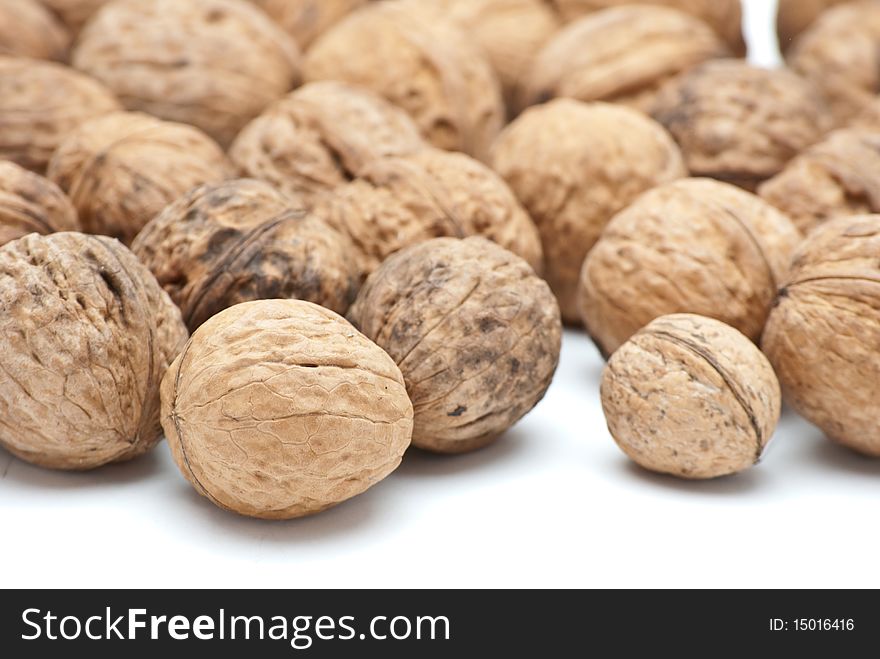 Walnuts isolated on a white background. Walnuts isolated on a white background.