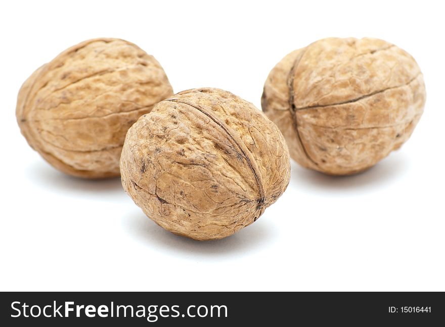 Walnuts isolated on a white background. Walnuts isolated on a white background.