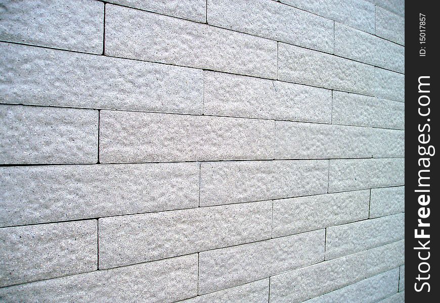 Bricks are compartible to the wall.It's white color .It made fromlime and cement.