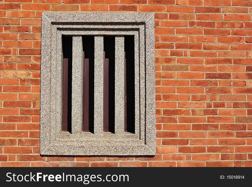 Traditional chinese style windor on red-bricks wall. Traditional chinese style windor on red-bricks wall