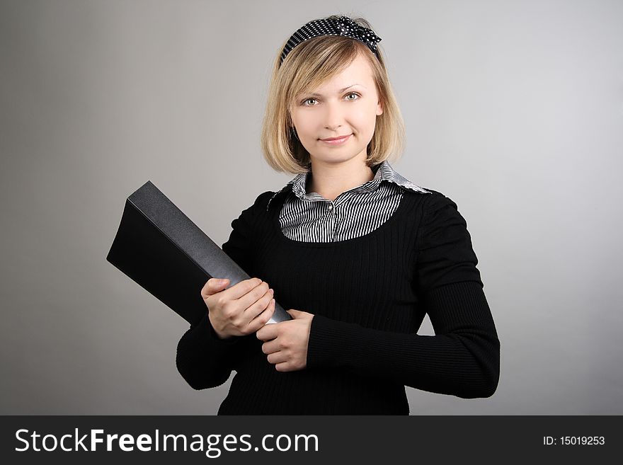 Portrait of business girl with papers in studio over white