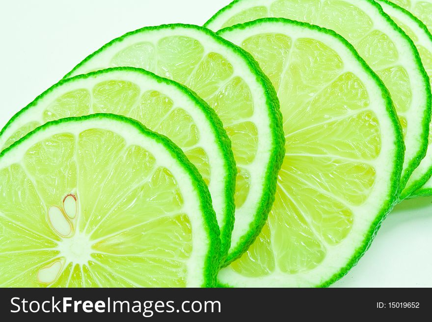 A lime slice on white background