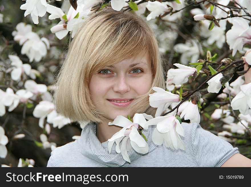 Pretty blonde over nature background. Pretty blonde over nature background