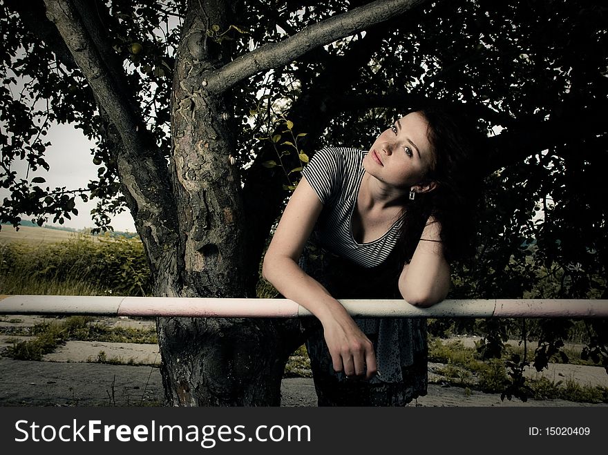 Young Woman Under Tree