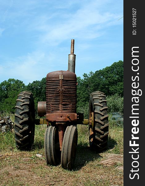 Old rusty farm tractor