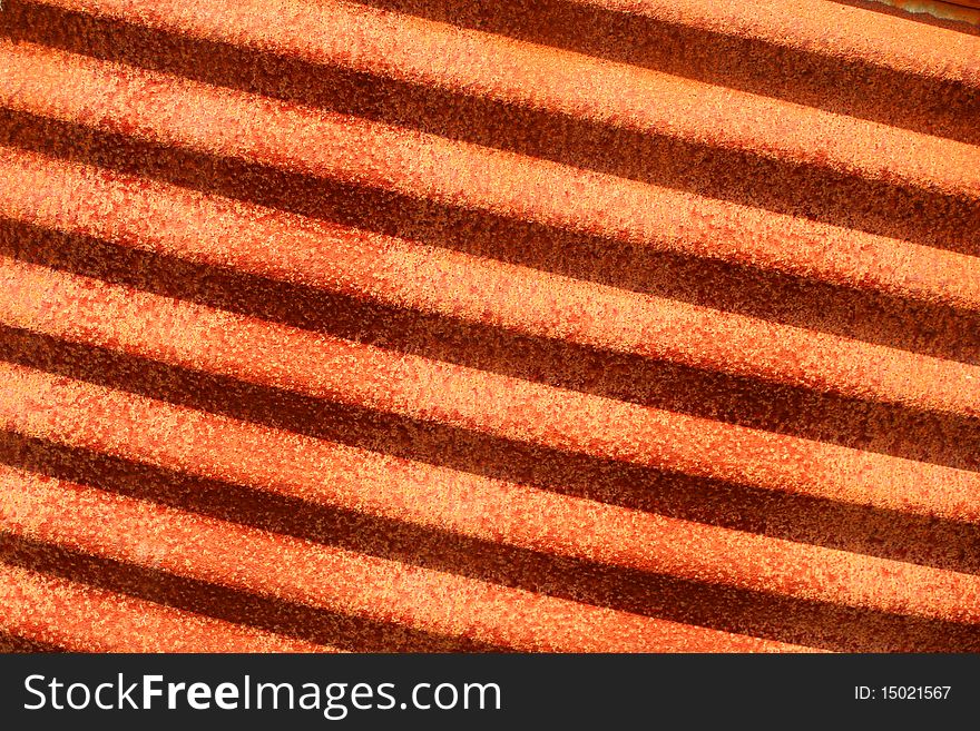 Rusty corrugated metal background texture