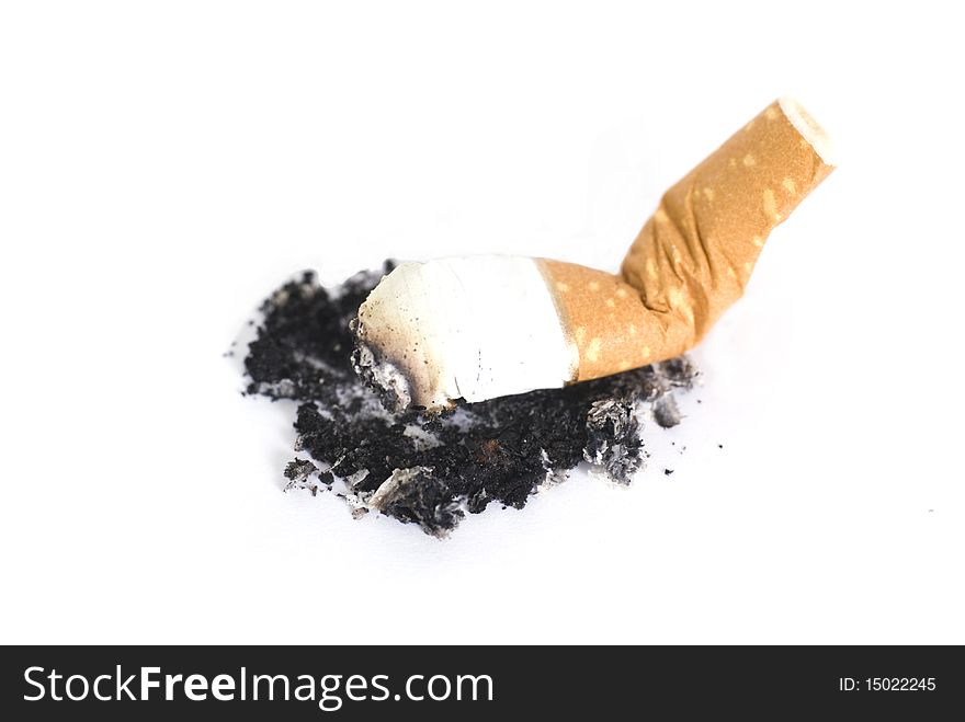 Shot of cigarette stump isolated on white background. Shot of cigarette stump isolated on white background.