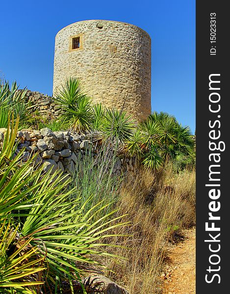 A View of Els Molins which are the ruins of windmills located at a high point in Javea, Costa Blanca, Spain. A View of Els Molins which are the ruins of windmills located at a high point in Javea, Costa Blanca, Spain