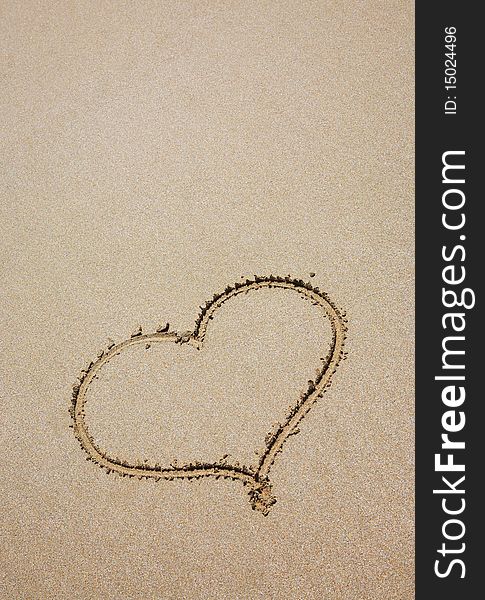 Heart drawing on sea sand. Heart drawing on sea sand