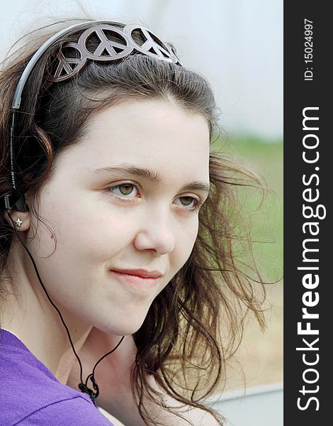 Young beautiful women listening to music