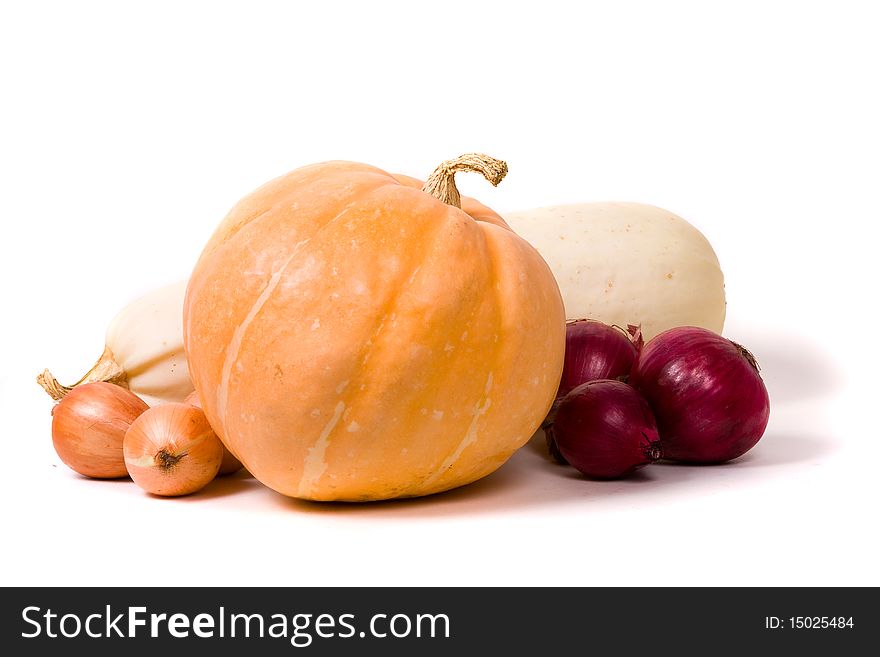 Vegetables(pumpkin, vegetable marrow, red onions). Vegetables isolated on a white background with a drop shadow.