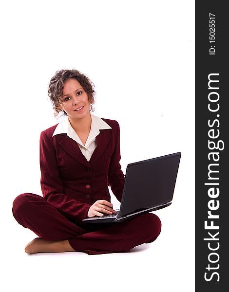 Attractive businesswoman with  laptop on white background Young operator works on computer. Attractive businesswoman with  laptop on white background Young operator works on computer.