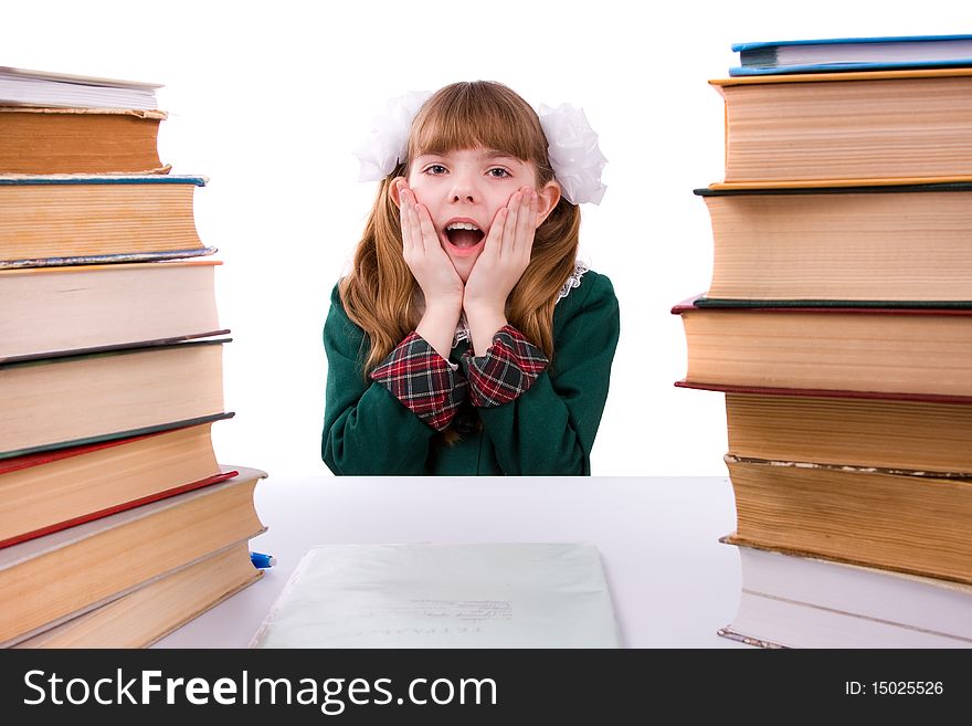 Senior high school student in uniform is sitting on the stack of book and study up. Young and beautiful schoolgirl is wearing a traditional uniform is shocked by something. Senior high school student in uniform is sitting on the stack of book and study up. Young and beautiful schoolgirl is wearing a traditional uniform is shocked by something.