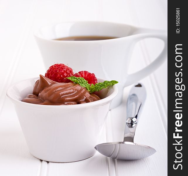 Creamy chocolate pudding with fresh rasberries and mint. Creamy chocolate pudding with fresh rasberries and mint.