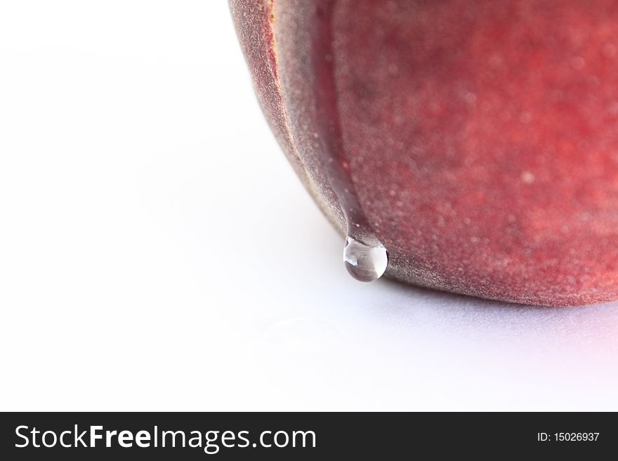 Fresh red peach with leaking water drop closeup, macro. Fresh red peach with leaking water drop closeup, macro