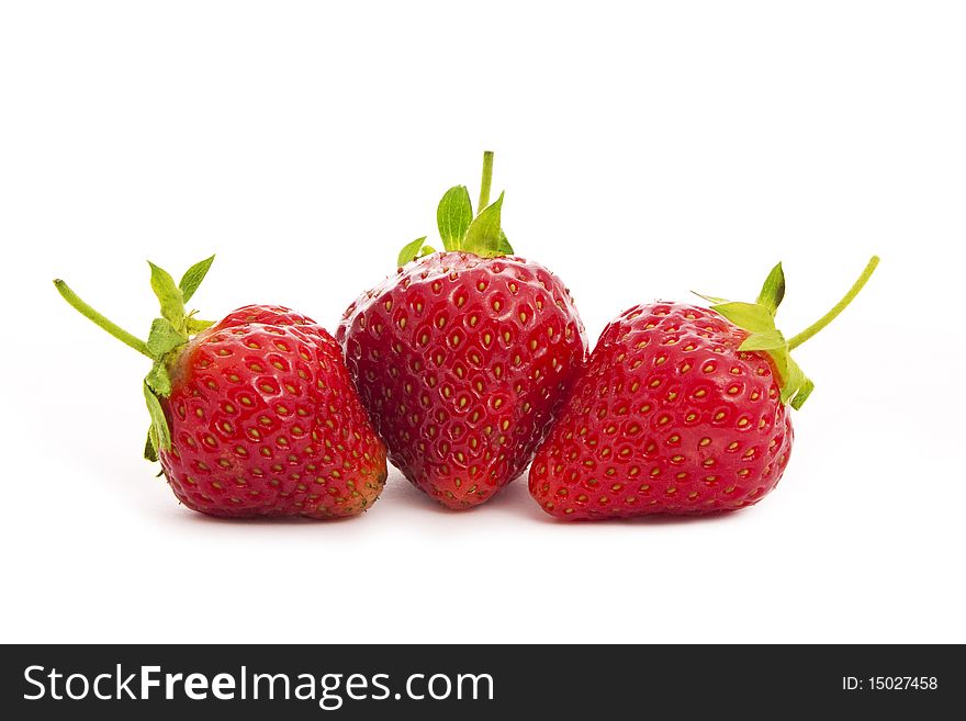 Strawberries isolated on white close-up. Strawberries isolated on white close-up