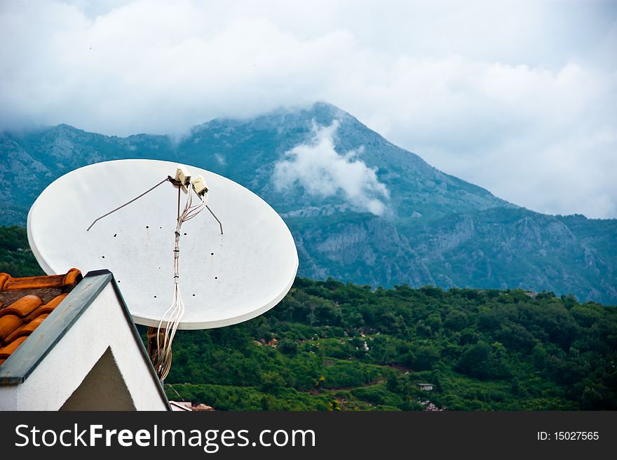 Satellite dish, roof and mountains, summer 2010, Montenegro