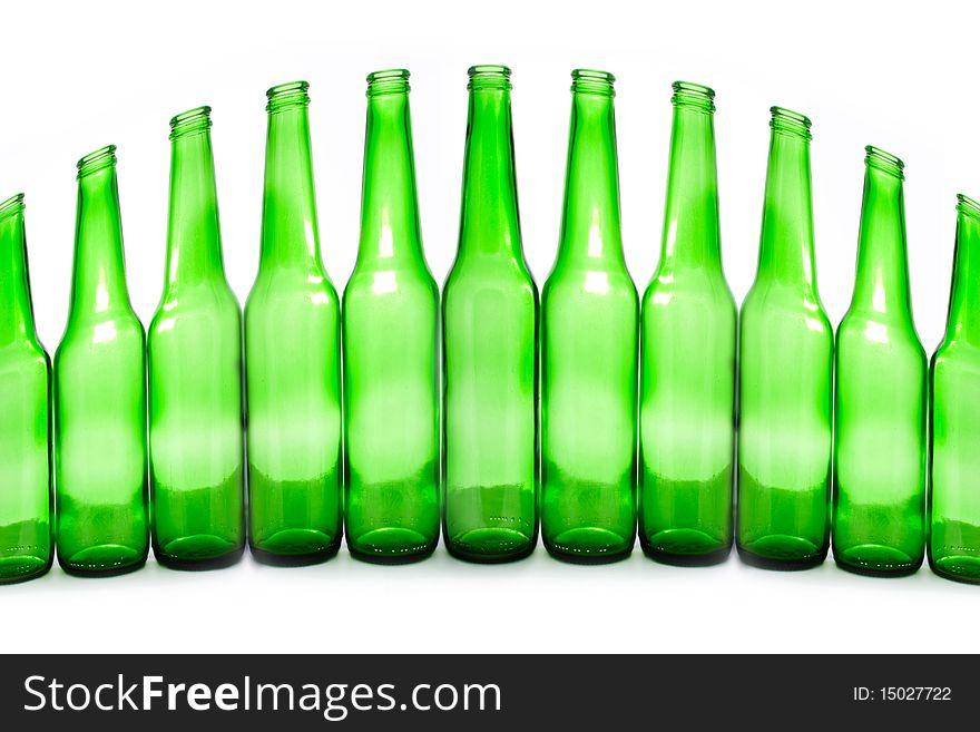 Green bottles isolated on white creative background