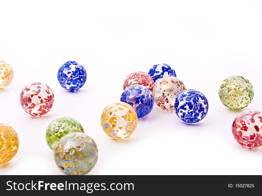 Colorful decorative glass balls isolated on white