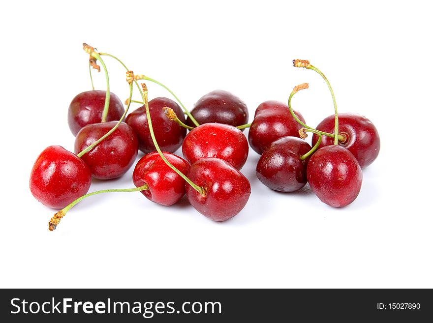 Ripe cherries isolated on white background