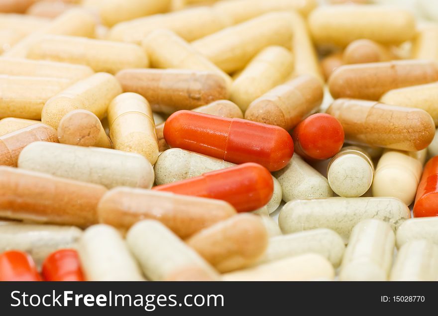 Heap of pills background close up